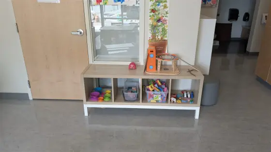 Learning materials shelf in the Caterpillar Room